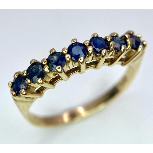 698 - A 9K YELLOW GOLD SAPPHIRE SET BAND RING 2.5G SIZE P

SC 4056