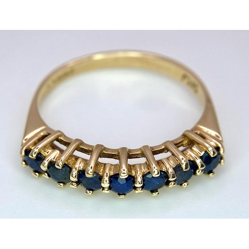 698 - A 9K YELLOW GOLD SAPPHIRE SET BAND RING 2.5G SIZE P

SC 4056