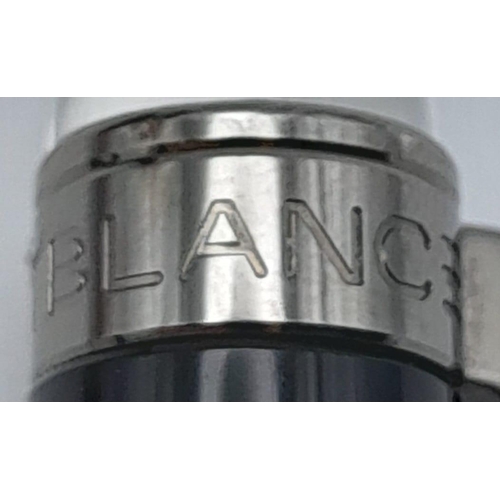 1115 - A MONT-BLANC PEN WITH THE CLEAR DOME END AND TWIST EXPOSURE,