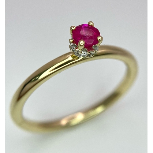 680 - A 9K YELLOW GOLD 4 CLAW RUBY SET SOLITAIRE RING WITH DIAMOND SET HIDDEN HALO 0.27CT RUBY 2.1G SIZE O... 