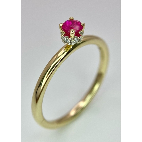 680 - A 9K YELLOW GOLD 4 CLAW RUBY SET SOLITAIRE RING WITH DIAMOND SET HIDDEN HALO 0.27CT RUBY 2.1G SIZE O... 