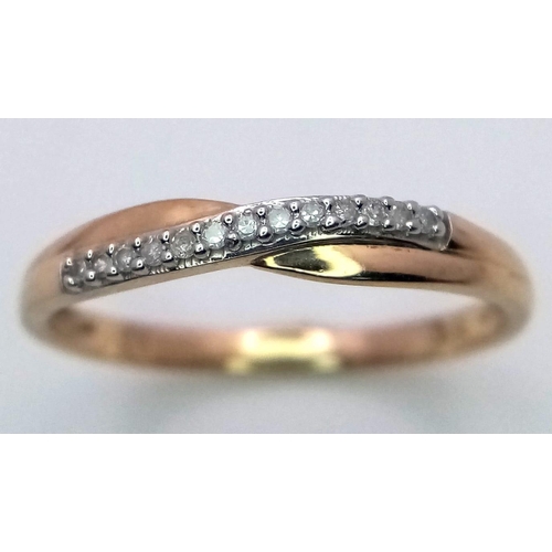 684 - A 9K YELLOW GOLD DIAMOND CROSSOVER RING 1.2G SIZE P

SC 4006