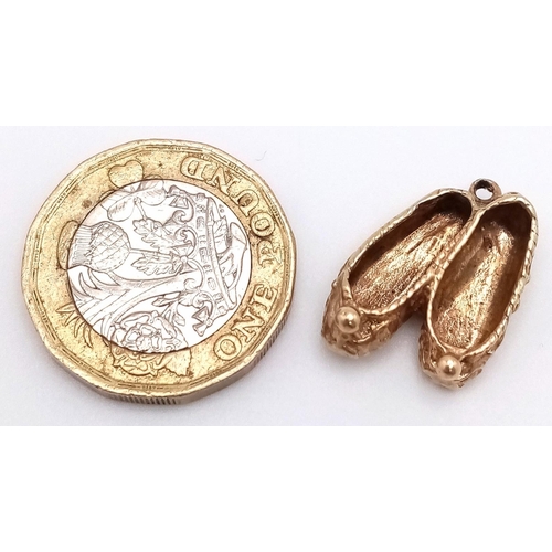 717 - A Pair of 9K Yellow Gold Slippers Pendant/Charm. 22mm. 3.1g weight.