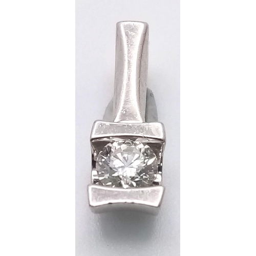 740 - A SPARKLING 18K	PLATINUM DIAMOND SOLITAIRE DROP PENDANT, WITH APPROX 0.24CT ROUND BRILLIANT CUT DIAM... 