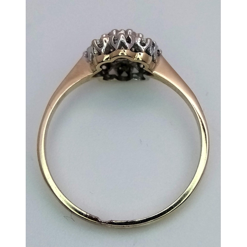 817 - A 9K GOLD DIAMOND CLUSTER RING  .    1.5gms   size M