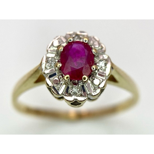 824 - A 9K GOLD DIAMOND AND RUBY CLUSTER RING .   1.8gms    size M