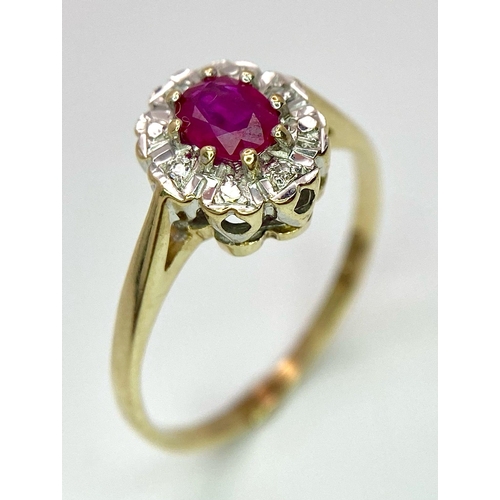 824 - A 9K GOLD DIAMOND AND RUBY CLUSTER RING .   1.8gms    size M