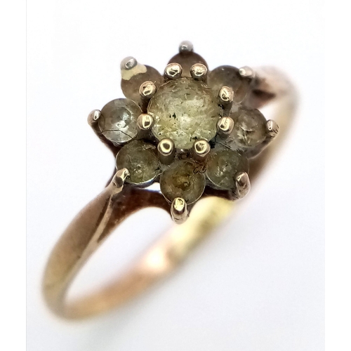 997 - a fancy 9K yellow gold Diamond floral cluster ring. Total weight 1.35G. Size K/L.  Approx 0.30ct dia... 