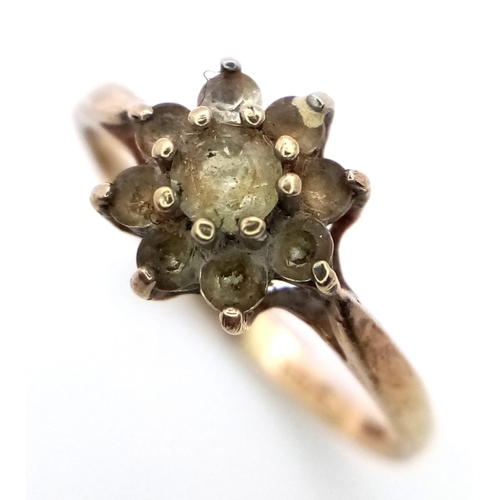 997 - a fancy 9K yellow gold Diamond floral cluster ring. Total weight 1.35G. Size K/L.  Approx 0.30ct dia... 