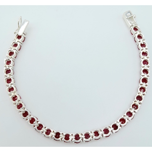 1109 - A Ruby Tennis Bracelet on 925 Silver. 19cm length, 0.5cm rubies, 17g total weight.    Ref: CD-1191