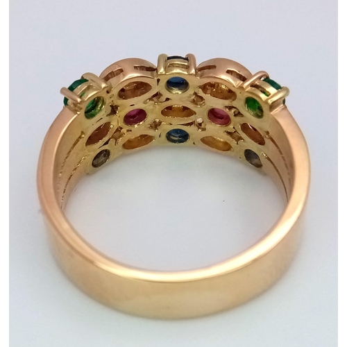 557 - A 18K YELLOW GOLD DIAMOND, RUBY, SAPPHIRE & EMERALD SET RING 7.3G SIZE N 1/2

ref: 6441