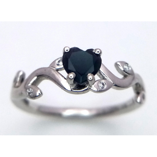 621 - A 9K WHITE GOLD DIAMOND & HEART SHAPE STONE SET RING 2.3G SIZE N 1/2

ref: SC 4041