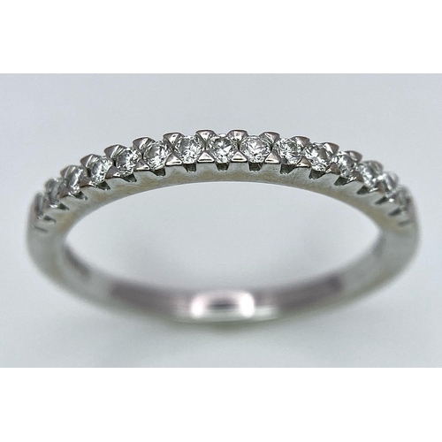 645 - A 18K WHITE GOLD DIAMOND BAND RING 0.15CT 2G SIZE J

A/S 1001