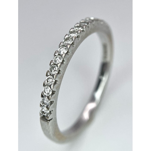 645 - A 18K WHITE GOLD DIAMOND BAND RING 0.15CT 2G SIZE J

A/S 1001