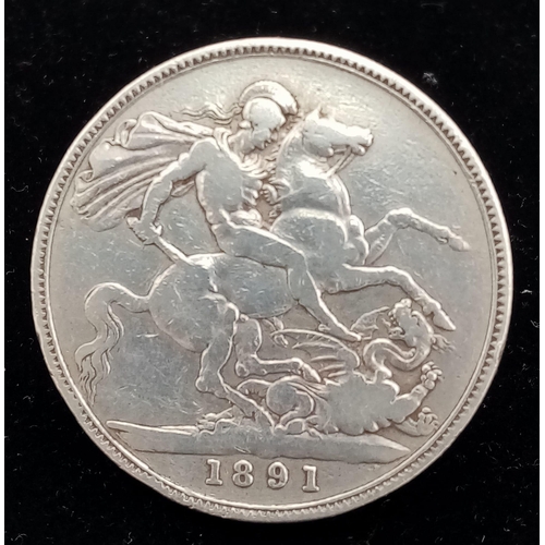 653 - An 1891 Queen Victoria Silver Crown. VF grade but please see photos.