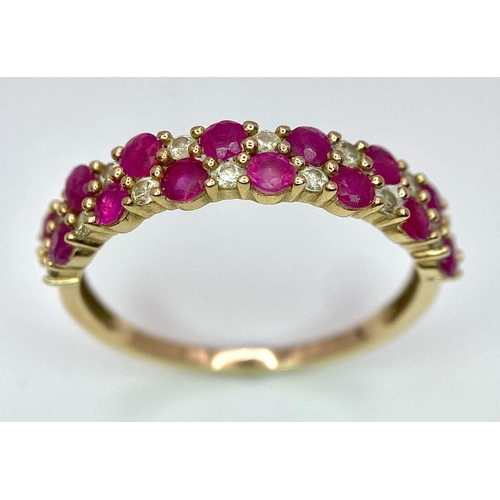 661 - A 9K YELLOW GOLD DIAMOND & RUBY 2 ROW RING 0.20CT DIAMONDS 1.9G SIZE R

ref: 7039