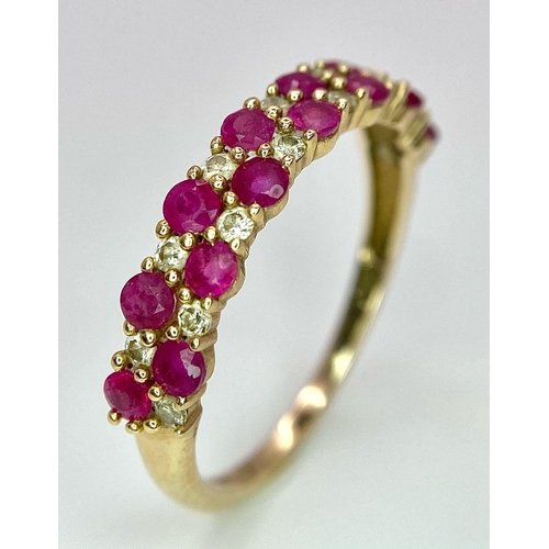 661 - A 9K YELLOW GOLD DIAMOND & RUBY 2 ROW RING 0.20CT DIAMONDS 1.9G SIZE R

ref: 7039