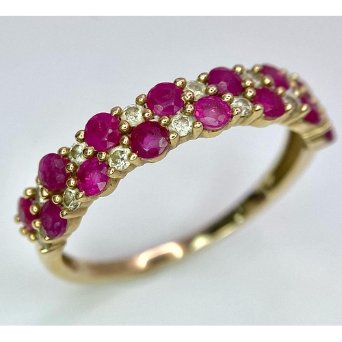 661 - A 9K YELLOW GOLD DIAMOND & RUBY 2 ROW RING 0.20CT DIAMONDS 1.9G SIZE R

ref: 7039