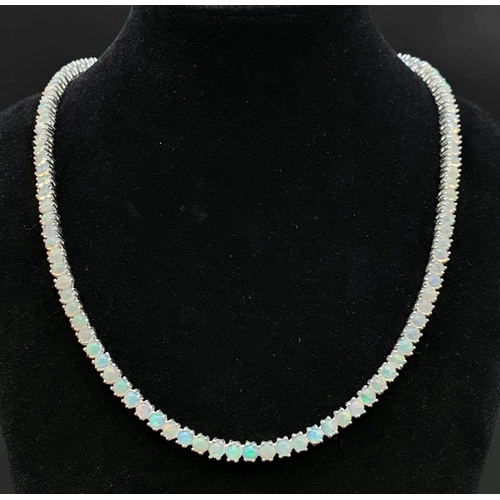 893 - An Opal Tennis Necklace on 925 Silver. 46.5cm length, 30.96g total weight.    Ref: CD-1194