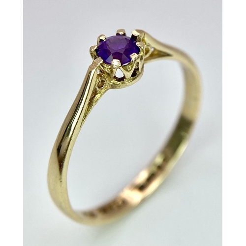 916 - A 9K GOLD AMETHYST SET RING  . 1.1gms    size N