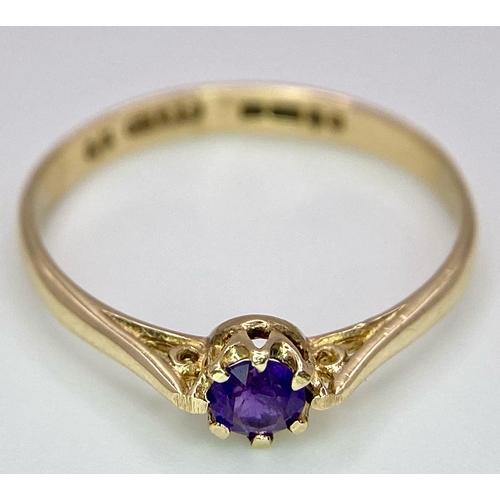 916 - A 9K GOLD AMETHYST SET RING  . 1.1gms    size N