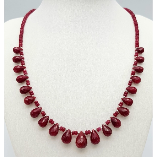 937 - A Ruby Beaded Necklace with Ruby Teardrops and 925 Silver Clasp. 160ctw rubies, 46cm length, 31.34g ... 