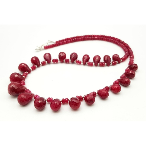 937 - A Ruby Beaded Necklace with Ruby Teardrops and 925 Silver Clasp. 160ctw rubies, 46cm length, 31.34g ... 