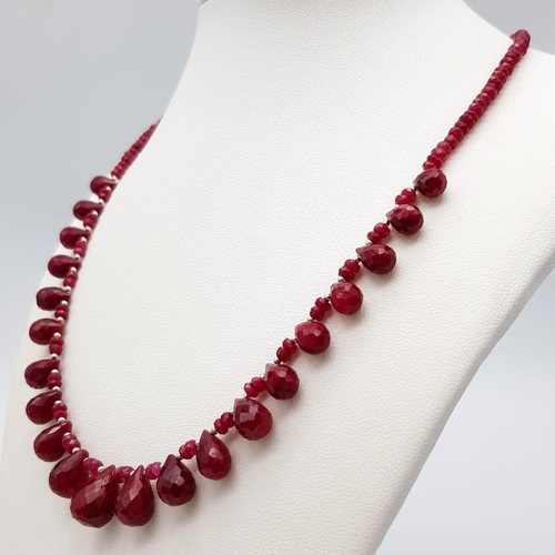 937 - A Ruby Beaded Necklace with Ruby Teardrops and 925 Silver Clasp. 160ctw rubies, 46cm length, 31.34g ... 