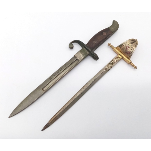 951 - A miniature bayonet with Bruges on the blade and a miniature Toledo sword letter openers. Bayonet 12... 