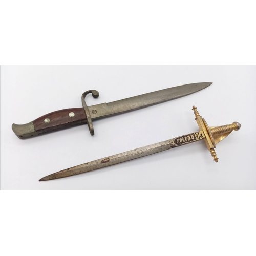 951 - A miniature bayonet with Bruges on the blade and a miniature Toledo sword letter openers. Bayonet 12... 