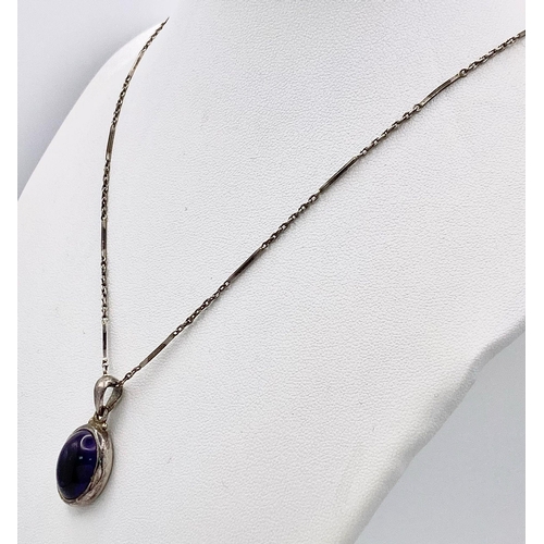 1089 - A vintage 925 silver Purple stone pendant on silver chain. Total weight 8.15G. Total length 58cm.