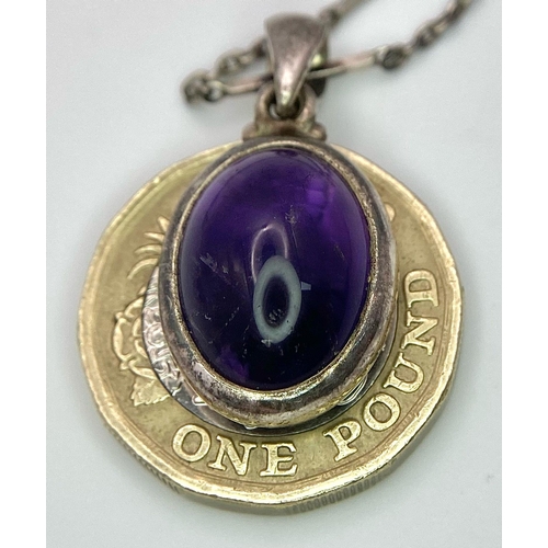 1089 - A vintage 925 silver Purple stone pendant on silver chain. Total weight 8.15G. Total length 58cm.