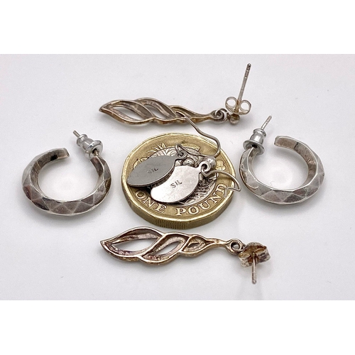 1184 - An electic collection of 3 stylist pair of silver earrings. Total weight 5.6G. Please see photos for... 