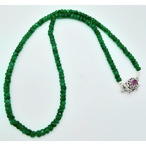 1186 - A 70ctw Emerald Necklace with a Ruby and 925 Silver Clasp. 46.5cm length, 17g total weight.    Ref: ... 