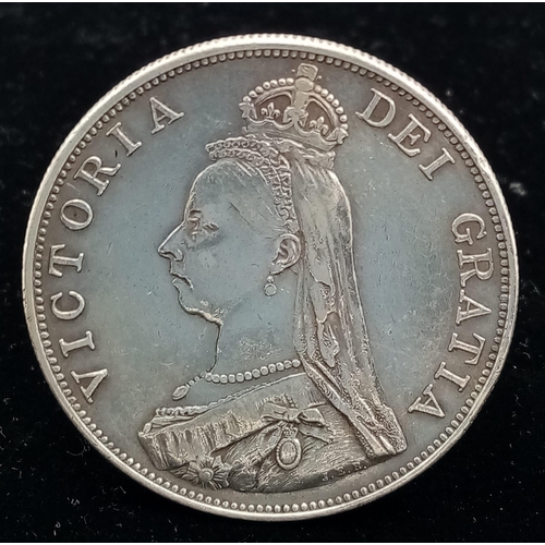 1192 - An 1889 Queen Victoria Silver Double Florin. VF grade but please see photos.