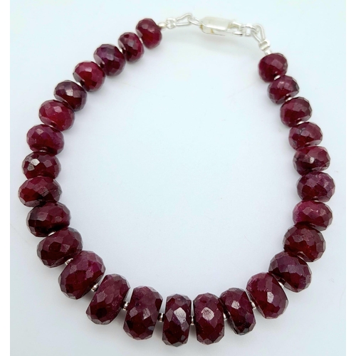 1193 - A 125ctw Rondelle Ruby Bracelet with a 925 Silver Clasp. 20cm length, 24.41g total weight.    Ref: C... 