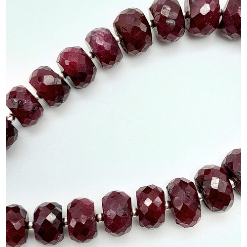 1193 - A 125ctw Rondelle Ruby Bracelet with a 925 Silver Clasp. 20cm length, 24.41g total weight.    Ref: C... 