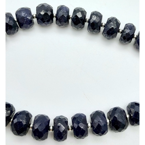 1197 - A 95ctw Rondelle Blue Sapphire Bracelet with 925 Silver Clasp. 19.5cm length, 18.36g total weight.  ... 