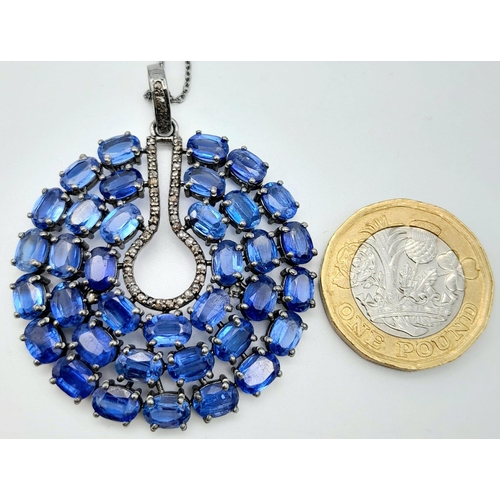 1211 - A Kyanite Pendant with Diamond Accents on a 925 Silver Chain. 24ctw kyanites, 0.55ctw diamonds. 5cm ... 