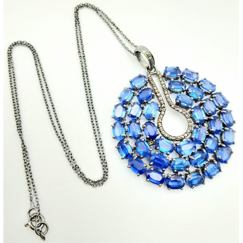 1211 - A Kyanite Pendant with Diamond Accents on a 925 Silver Chain. 24ctw kyanites, 0.55ctw diamonds. 5cm ... 