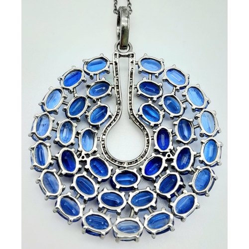 1211 - A Kyanite Pendant with Diamond Accents on a 925 Silver Chain. 24ctw kyanites, 0.55ctw diamonds. 5cm ... 