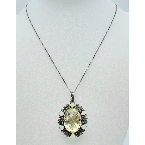 1225 - A Citrine Pendant with Opal and Diamond Surround on 925 Silver Chain.22ct citrine, 1.30ctw opals, 0.... 