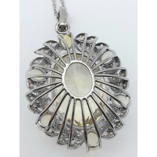 1225 - A Citrine Pendant with Opal and Diamond Surround on 925 Silver Chain.22ct citrine, 1.30ctw opals, 0.... 