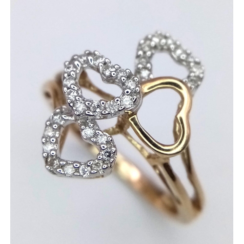 628 - A 9K YELLOW GOLD 4 HEARTS RING, WITH DIAMONDS SET SURROUND THE HEART. 2.4G SIZE N

SC 4044