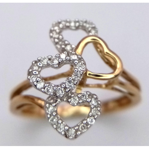 628 - A 9K YELLOW GOLD 4 HEARTS RING, WITH DIAMONDS SET SURROUND THE HEART. 2.4G SIZE N

SC 4044