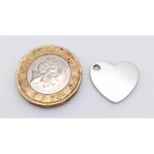 752 - A STERLING SILVER TIFFANY & CO HALLMARKED HEART PENDANT / CHARM 2.7G , 16mm x 18mm

ref: SC 4142