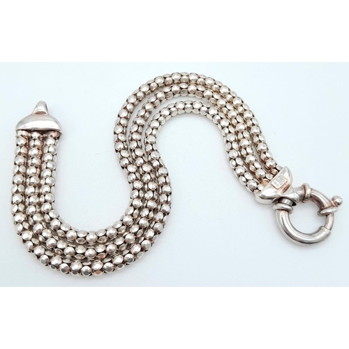 872 - A stylist Italian 925 silver triple row popcorn link bracelet. Total weight 17.4G. Total length 17cm... 