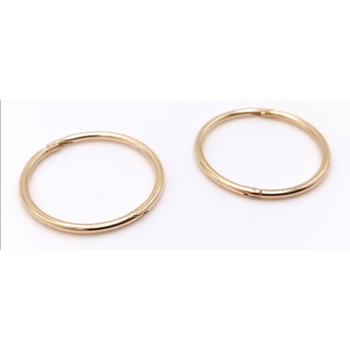 881 - A 9K YELLOW GOLD MINI SLEEPER HOOP EARRINGS 0.8G , 1.6cm diameter.

SC 4032