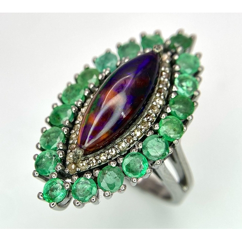 945 - A Black Opal Ring with an Emerald and Diamond Surround on 925 Silver. 2.3ctw emeralds, 0.40ctw diamo... 