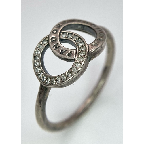 956 - A vintage 925 silver Pandora interlinked circle stone set ring. Total weight 2.35G. Size P.